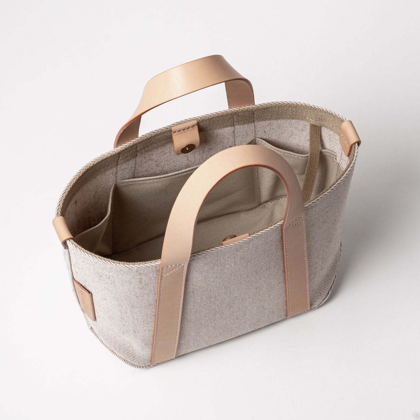 レザーハンドル 倉敷の綿麻帆布とヌメ革で仕立てた 丈夫な軽量トートS <生成り ecru>